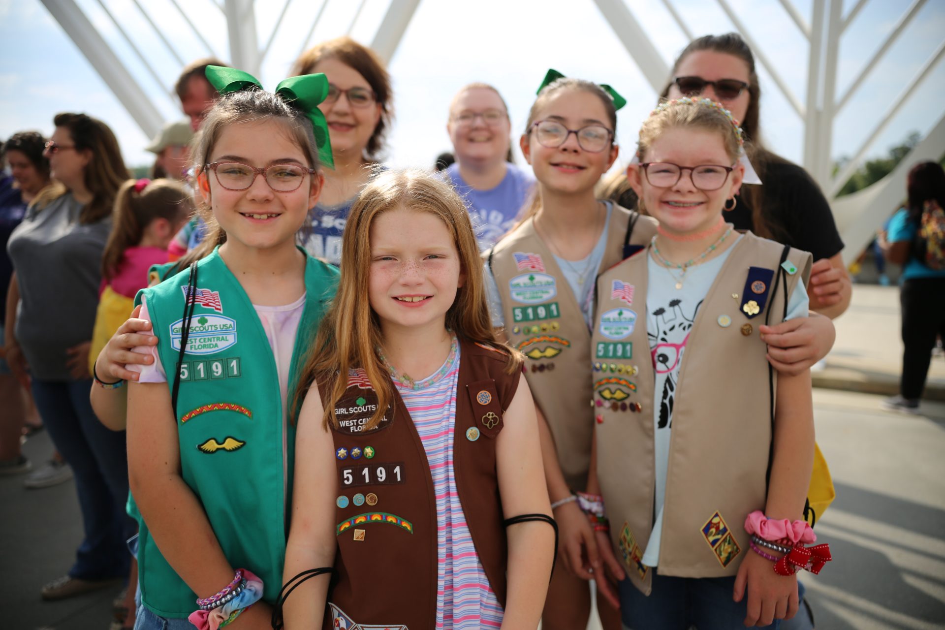 high school girl scout with daisy outside wearing uniforms